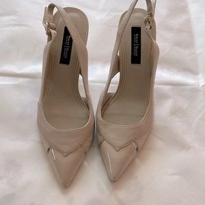 White and black shoes with the heel beach collar